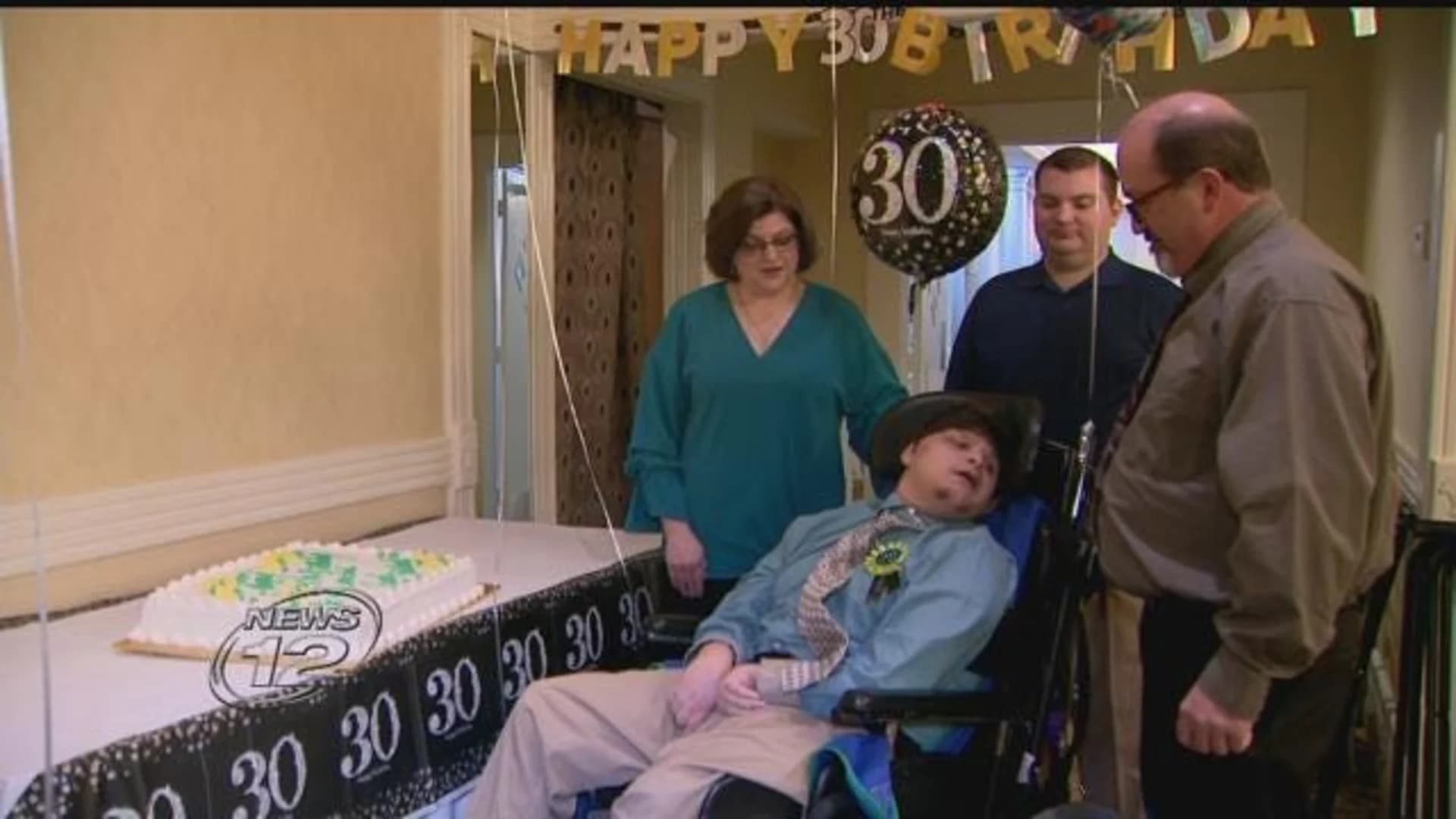 Man with cerebral palsy celebrates milestone birthday with family