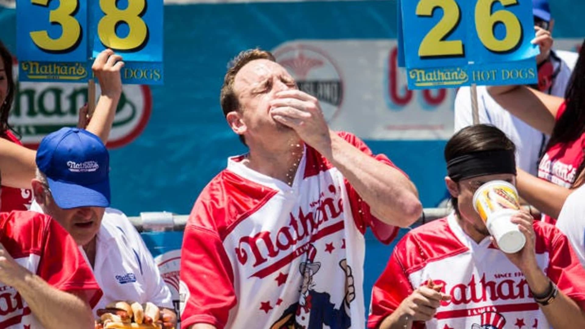 Defending champ Joey Chestnut sets record with 74 hot dogs