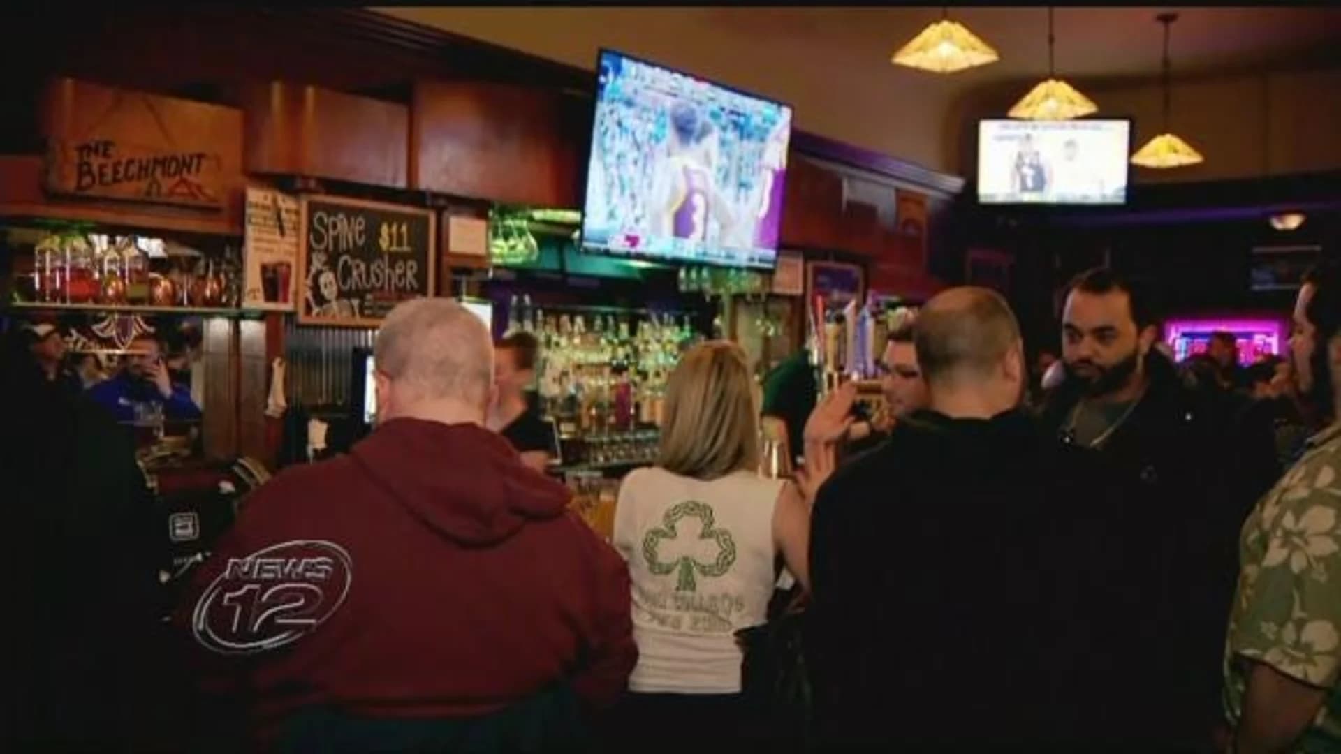 Iona fans cheer on basketball team from college bar