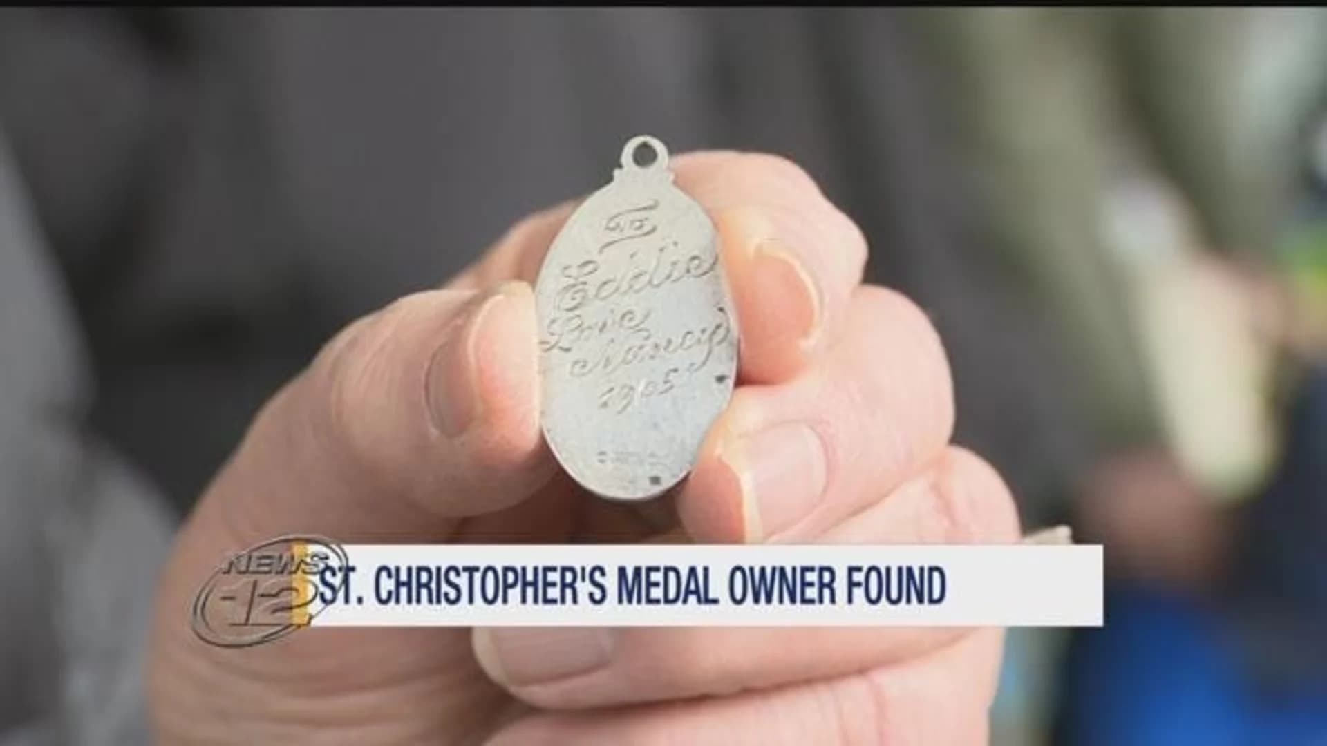 Lost medal found in wallet reunited with owner