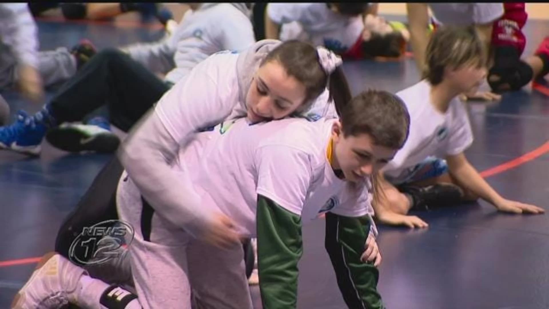 Wrestlers hit the mat to take down opioid epidemic