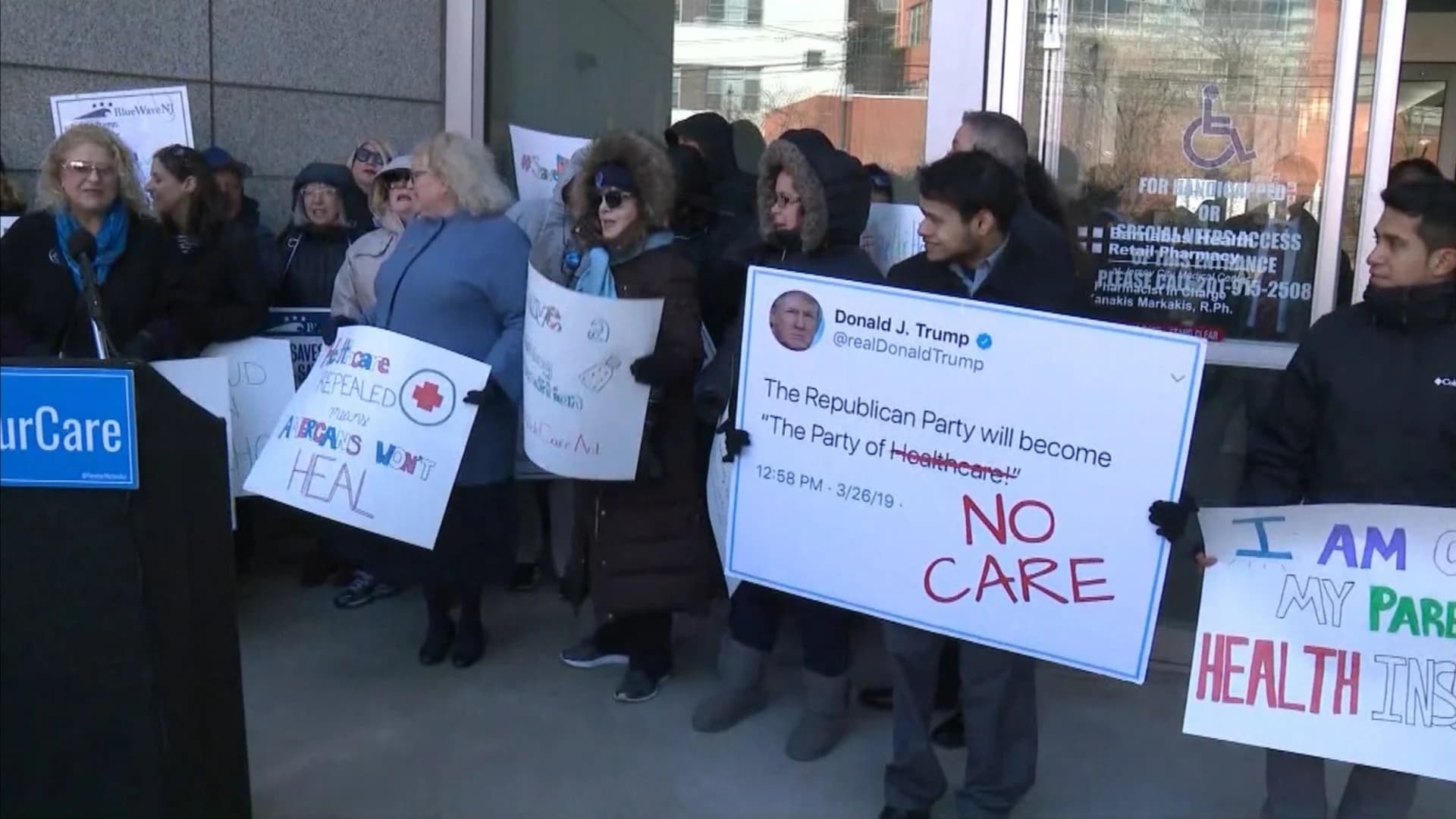 Demonstrators hold rally calling for preservation of Affordable Care Act