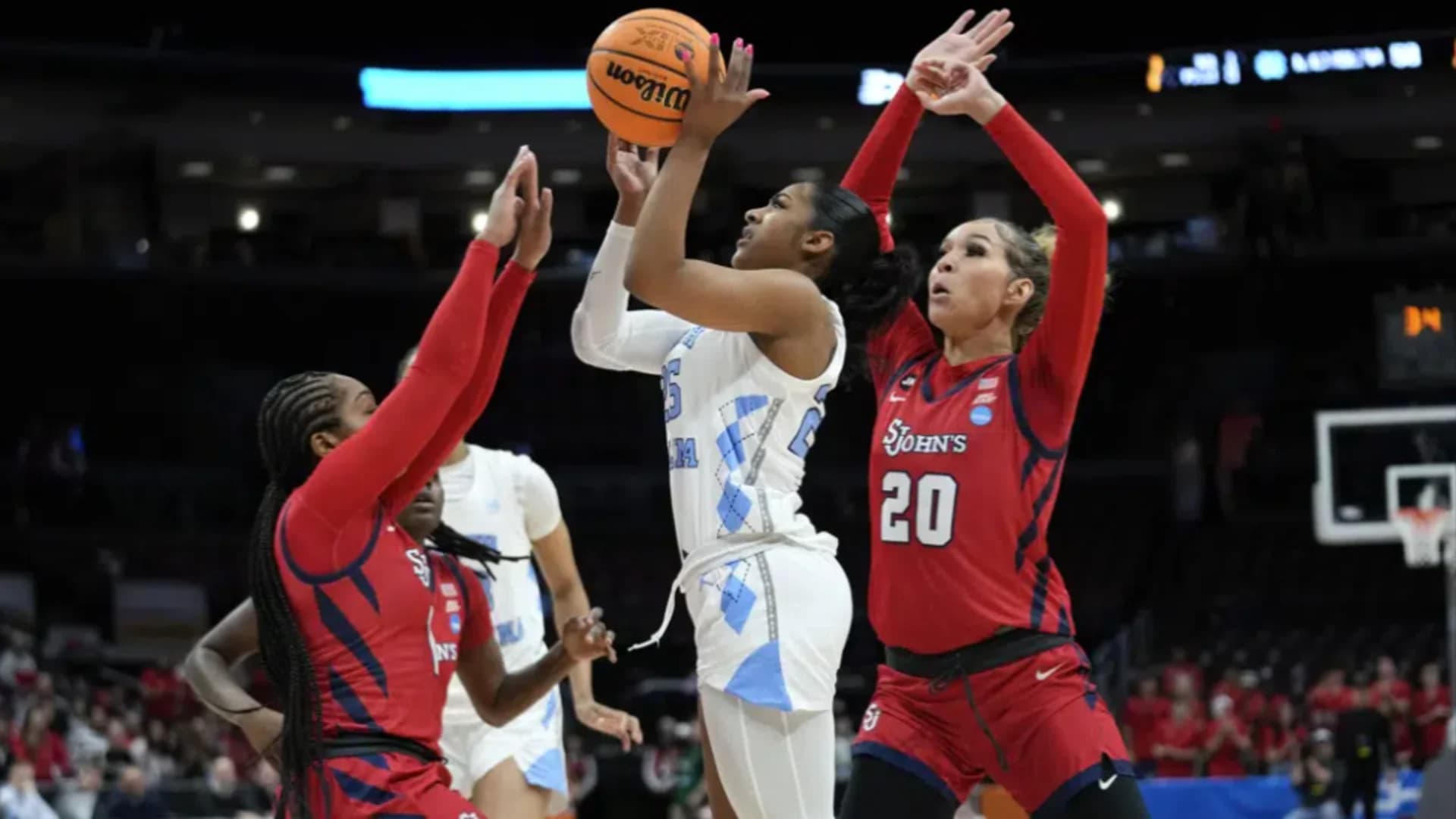 North Carolina holds off St. John’s 61-59 in March Madness