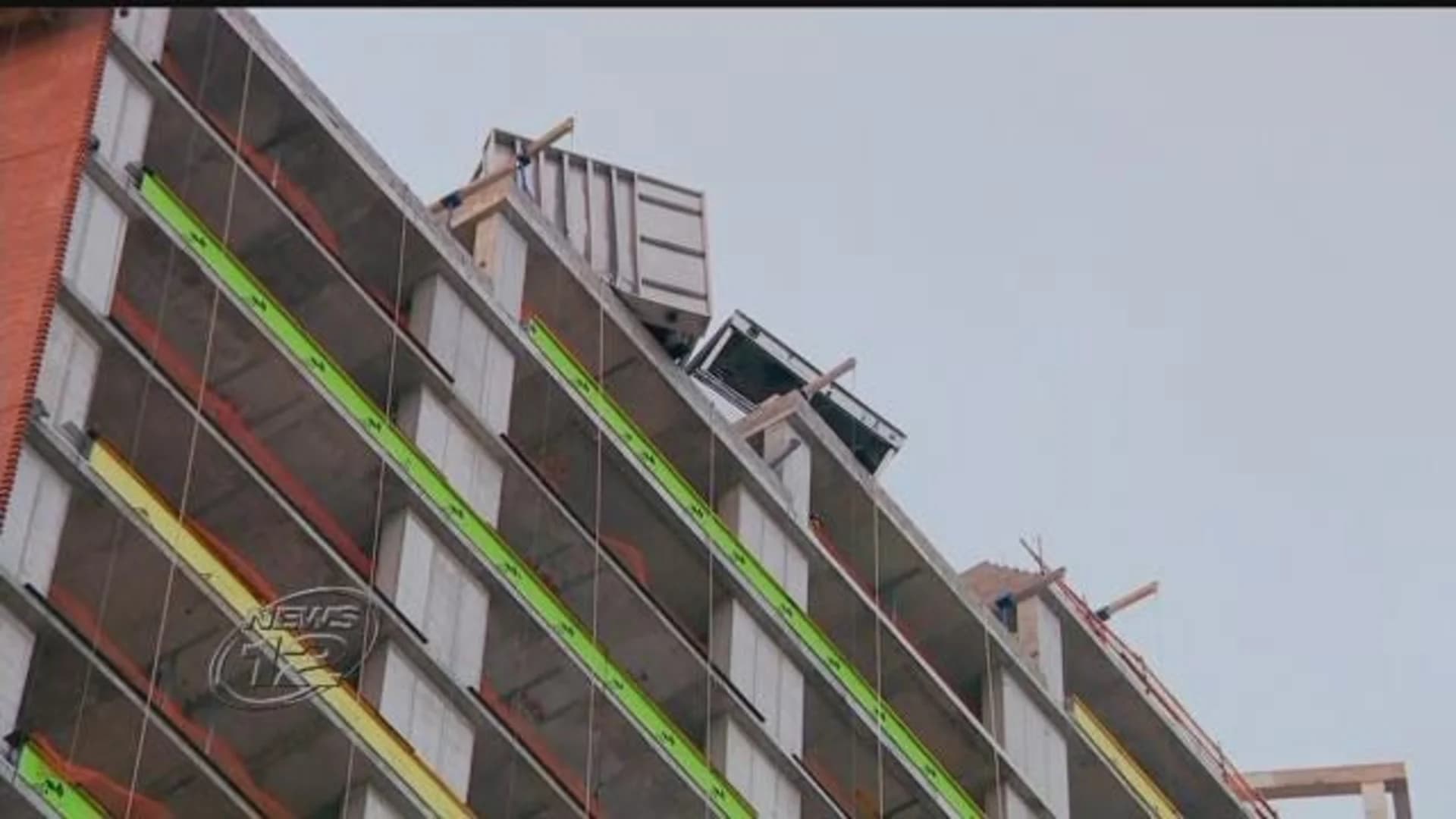 Firefighters secure A/C units that nearly fell off Yonkers building